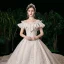 Élégant Champagne Transparentes La Mariée Robe De Mariée 2020 Robe Boule Encolure Carrée Manches Courtes Dos Nu Appliques En Dentelle Glitter Tulle Perlage Cathedral Train Volants