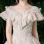Élégant Champagne Transparentes La Mariée Robe De Mariée 2020 Robe Boule Encolure Carrée Manches Courtes Dos Nu Appliques En Dentelle Glitter Tulle Perlage Cathedral Train Volants