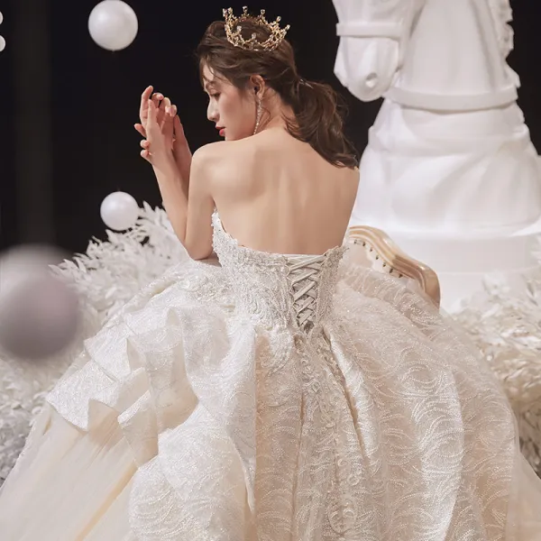 Luksus Champagne Bryllups Brudekjoler 2020 Ballkjole Kjæreste Uten Ermer Ryggløse Glitter Tyll Appliques Blonder Beading Royal Train Buste