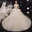 Luxe Champagne La Mariée Robe De Mariée 2020 Robe Boule De l'épaule Manches Courtes Dos Nu Appliques En Dentelle Perlage Glitter Tulle Chapel Train Volants