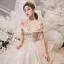 Luxe Champagne La Mariée Robe De Mariée 2020 Robe Boule De l'épaule Manches Courtes Dos Nu Appliques En Dentelle Perlage Glitter Tulle Chapel Train Volants