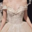 Luxe Champagne La Mariée Robe De Mariée 2020 Robe Boule De l'épaule Manches Courtes Dos Nu Appliques En Dentelle Perlage Glitter Tulle Chapel Train Volants