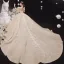 Style Victorien Champagne Transparentes La Mariée Robe De Mariée 2020 Robe Boule Encolure Dégagée Gonflée Manches Courtes Dos Nu Appliques En Dentelle Paillettes Perlage Cathedral Train Volants