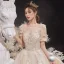 Style Victorien Champagne Transparentes La Mariée Robe De Mariée 2020 Robe Boule Encolure Dégagée Gonflée Manches Courtes Dos Nu Appliques En Dentelle Paillettes Perlage Cathedral Train Volants