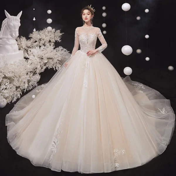 Illusion Champagne See-through Bridal Wedding Dresses 2020 Ball Gown High Neck Long Sleeve Backless Glitter Tulle Appliques Lace Beading Cathedral Train Ruffle