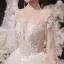 Illusion Champagne See-through Bridal Wedding Dresses 2020 Ball Gown High Neck Long Sleeve Backless Glitter Tulle Appliques Lace Beading Cathedral Train Ruffle