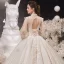 Vintage / Retro Victorian Style Champagne See-through Bridal Wedding Dresses 2020 Ball Gown High Neck Puffy Long Sleeve Backless Flower Appliques Lace Beading Glitter Tulle Cathedral Train Ruffle