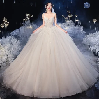 Luxe Champagne La Mariée Robe De Mariée 2020 Robe Boule Épaules Sans Manches Dos Nu Perlage Paillettes Royal Train Volants