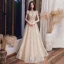 Vintage / Originale Champagne Robe De Soirée 2020 Princesse Col Haut Manches Courtes Appliques Paillettes Longue Volants Dos Nu Robe De Ceremonie