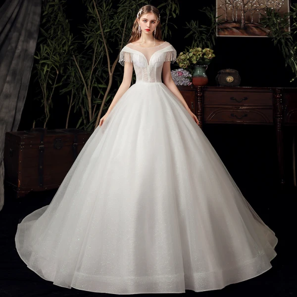 Chic / Belle Ivoire Transparentes La Mariée Robe De Mariée 2020 Robe Boule Encolure Dégagée Manches Courtes Dos Nu Perlage Gland Glitter Tulle Chapel Train