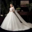 Chic / Belle Ivoire Transparentes La Mariée Robe De Mariée 2020 Robe Boule Encolure Dégagée Manches Courtes Dos Nu Perlage Gland Glitter Tulle Chapel Train