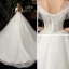 Chic / Belle Ivoire Transparentes La Mariée Robe De Mariée 2020 Robe Boule Encolure Dégagée Manches Courtes Dos Nu Perlage Gland Glitter Tulle Chapel Train