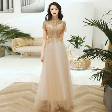 Chic Beautiful Gold See Through Evening Dresses 2020 A Line Princess High Neck Short Sleeve Beading Appliques Sequins Floor Length Long Ruffle Formal Dresses