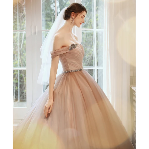 Elegant Pearl Pink Prom Dresses 2020 Ball Gown Off-The-Shoulder Short Sleeve Rhinestone Sash Glitter Tulle Chapel Train Ruffle Backless Formal Dresses