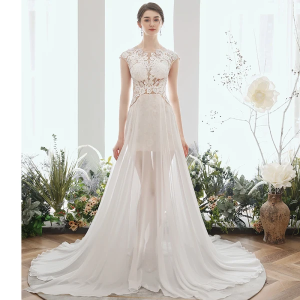 Illusion Ivoire Chiffon Été La Mariée Robe De Mariée 2020 Princesse Encolure Dégagée Sans Manches Appliques En Dentelle Perlage Tribunal Train Volants