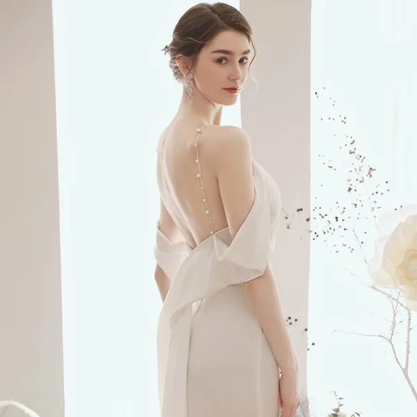 Elegant Ivory Evening Dresses  2020 Trumpet / Mermaid Pearl Halter Short Sleeve Sweep Train Ruffle Backless Formal Dresses