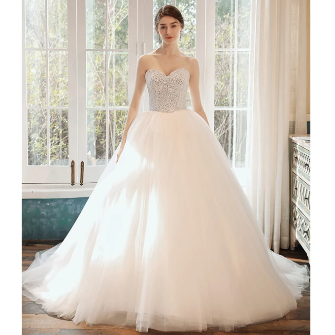 Romantisk Hvit Bryllups Brudekjoler 2020 Ballkjole Kjæreste Uten Ermer Ryggløse Paljetter Beading Cathedral Train Buste