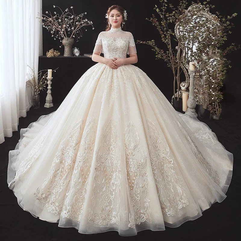 Vintage Retro Champagne Plus Size Wedding Dresses 2020 See Through High  Neck Short Sleeve Backless Beading Tassel Appliques Lace Sequins Cathedral  Train Ruffle
