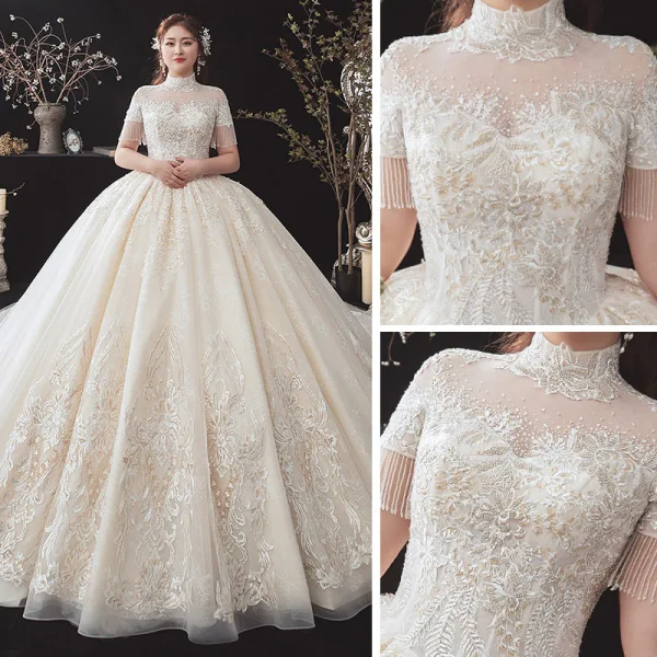Vintage / Originale Champagne Grande Taille Robe De Mariée 2020 Transparentes Col Haut Manches Courtes Dos Nu Perlage Gland Appliques En Dentelle Paillettes Cathedral Train Volants