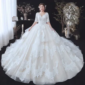Chic Beautiful Champagne Plus Size Wedding Dresses 2020 Ball Gown V Neck 1 2 Sleeves Backless Appliques Lace Beading Cathedral Train Ruffle
