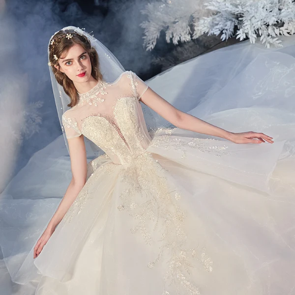 Vintage / Retro Champagne Organza Bridal Wedding Dresses 2020 Ball Gown See-through High Neck Short Sleeve Backless Appliques Lace Beading Cathedral Train Ruffle