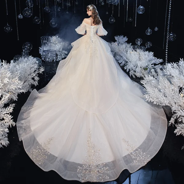 Victorian Style Champagne Bridal Wedding Dresses 2020 Ball Gown Off-The-Shoulder Puffy 1/2 Sleeves Backless Appliques Lace Beading Glitter Tulle Cathedral Train Ruffle