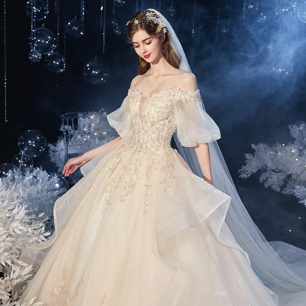 Victorian Style Champagne Bridal Wedding Dresses 2020 Ball Gown Off-The-Shoulder Puffy 1/2 Sleeves Backless Appliques Lace Beading Glitter Tulle Cathedral Train Ruffle