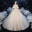 Élégant Champagne Transparentes La Mariée Robe De Mariée 2020 Robe Boule Encolure Carrée 1/2 Manches Manches de cloche Dos Nu Appliques En Dentelle Perlage Glitter Tulle Cathedral Train Volants