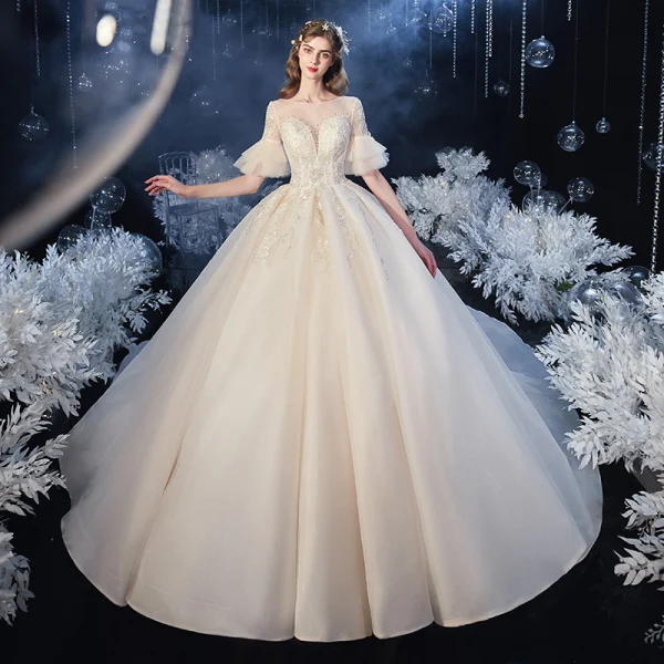 Élégant Champagne Transparentes La Mariée Robe De Mariée 2020 Robe Boule Encolure Carrée 1/2 Manches Manches de cloche Dos Nu Appliques En Dentelle Perlage Glitter Tulle Cathedral Train Volants
