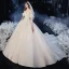Élégant Champagne Transparentes La Mariée Robe De Mariée 2020 Robe Boule Encolure Carrée 1/2 Manches Manches de cloche Dos Nu Appliques En Dentelle Perlage Glitter Tulle Cathedral Train Volants