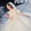 Élégant Champagne Transparentes La Mariée Robe De Mariée 2020 Robe Boule Encolure Carrée 1/2 Manches Manches de cloche Dos Nu Appliques En Dentelle Perlage Glitter Tulle Cathedral Train Volants