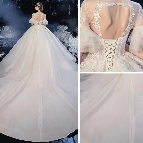 Élégant Champagne Transparentes La Mariée Robe De Mariée 2020 Robe Boule Encolure Carrée 1/2 Manches Manches de cloche Dos Nu Appliques En Dentelle Perlage Glitter Tulle Cathedral Train Volants