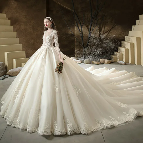 Illusion Champagne See-through Bridal Wedding Dresses 2020 Ball Gown Scoop Neck 3/4 Sleeve Backless Pierced Appliques Lace Beading Cathedral Train Ruffle