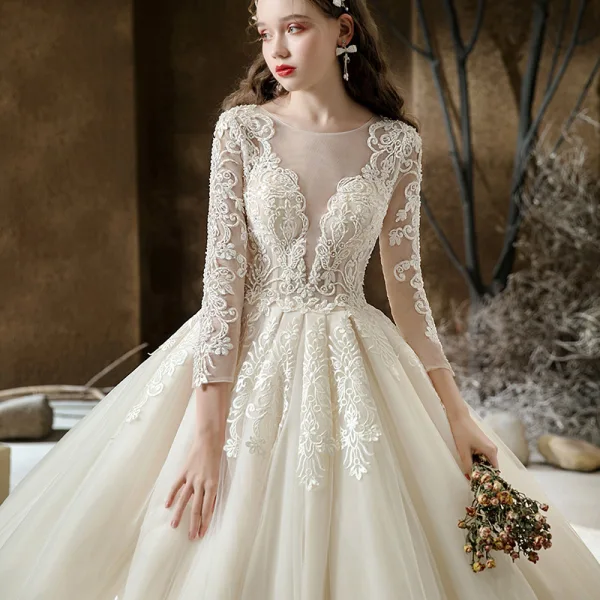 Illusion Champagne See-through Bridal Wedding Dresses 2020 Ball Gown Scoop Neck 3/4 Sleeve Backless Pierced Appliques Lace Beading Cathedral Train Ruffle