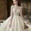 Illusion Champagne See-through Bridal Wedding Dresses 2020 Ball Gown Scoop Neck 3/4 Sleeve Backless Pierced Appliques Lace Beading Cathedral Train Ruffle