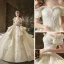 Luxe Champagne La Mariée Robe De Mariée 2020 Robe Boule De l'épaule Manches Courtes Dos Nu Appliques En Dentelle Perlage Royal Train Volants