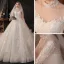 Vintage / Retro Champagne See-through Bridal Wedding Dresses 2020 Ball Gown High Neck 1/2 Sleeves Backless Appliques Lace Beading Cathedral Train Ruffle