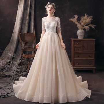Abordable Champagne Transparentes Robe De Mariée 2020 Princesse Encolure Dégagée 1 2 Manches Dos Nu Appliques Paillettes Perlage Glitter Tulle Train De Balayage Volants