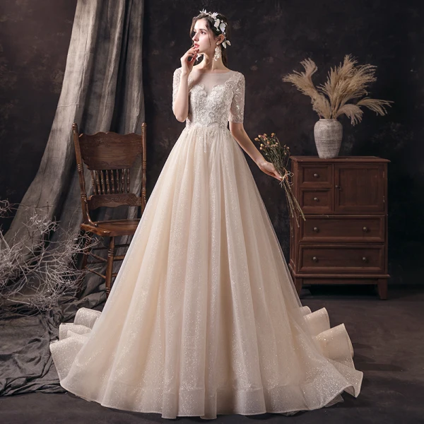 Affordable Champagne See-through Wedding Dresses 2020 A-Line / Princess Scoop Neck 1/2 Sleeves Backless Appliques Sequins Beading Glitter Tulle Sweep Train Ruffle