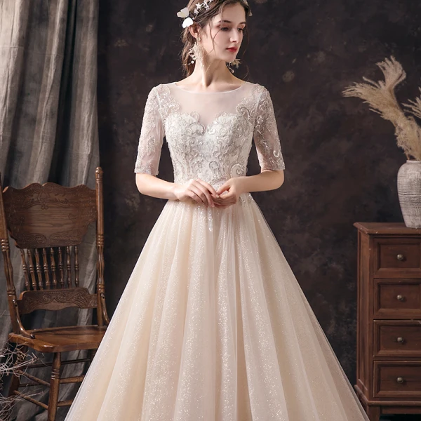 Affordable Champagne See-through Wedding Dresses 2020 A-Line / Princess Scoop Neck 1/2 Sleeves Backless Appliques Sequins Beading Glitter Tulle Sweep Train Ruffle