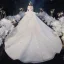 Luxe Champagne La Mariée Robe De Mariée 2020 Robe Boule De l'épaule Manches Courtes Dos Nu Appliques En Dentelle Perlage Glitter Tulle Royal Train Volants