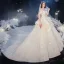 Luxe Champagne La Mariée Robe De Mariée 2020 Robe Boule De l'épaule Manches Courtes Dos Nu Appliques En Dentelle Perlage Glitter Tulle Royal Train Volants