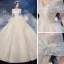 Luxe Champagne La Mariée Robe De Mariée 2020 Robe Boule De l'épaule Manches Courtes Dos Nu Appliques En Dentelle Perlage Glitter Tulle Royal Train Volants