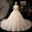 Chic / Belle Champagne Transparentes Robe De Mariée 2020 Robe Boule V-Cou 3/4 Manches Dos Nu Feuille Appliques En Dentelle Perlage Glitter Tulle Cathedral Train