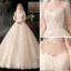 Vintage / Retro Champagne Bridal Wedding Dresses 2020 Ball Gown See-through High Neck 1/2 Sleeves Backless Appliques Lace Beading Glitter Tulle Cathedral Train