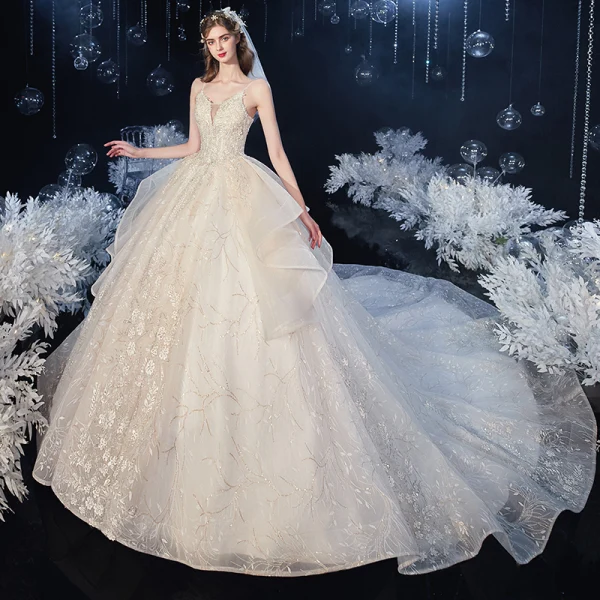 Romantic Champagne Bridal Wedding Dresses 2020 Ball Gown Spaghetti Straps Sleeveless Backless Leaf Appliques Lace Sequins Beading Cathedral Train Ruffle