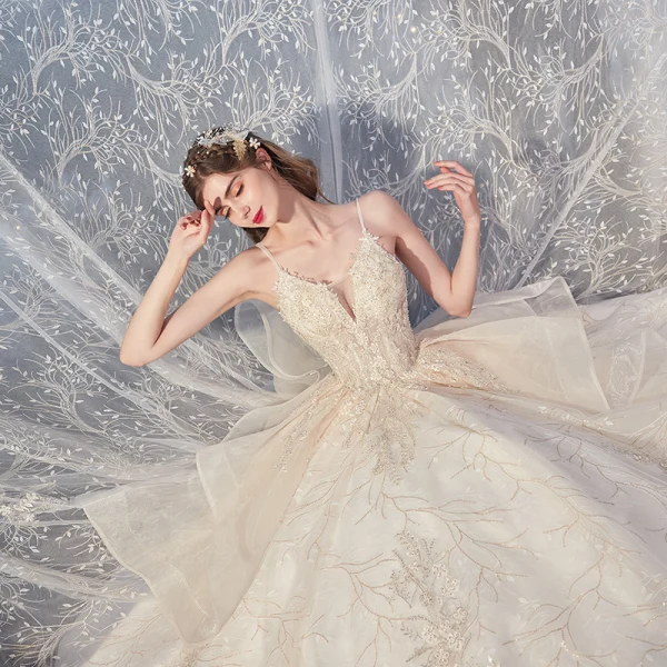 Romantic Champagne Bridal Wedding Dresses 2020 Ball Gown Spaghetti Straps Sleeveless Backless Leaf Appliques Lace Sequins Beading Cathedral Train Ruffle