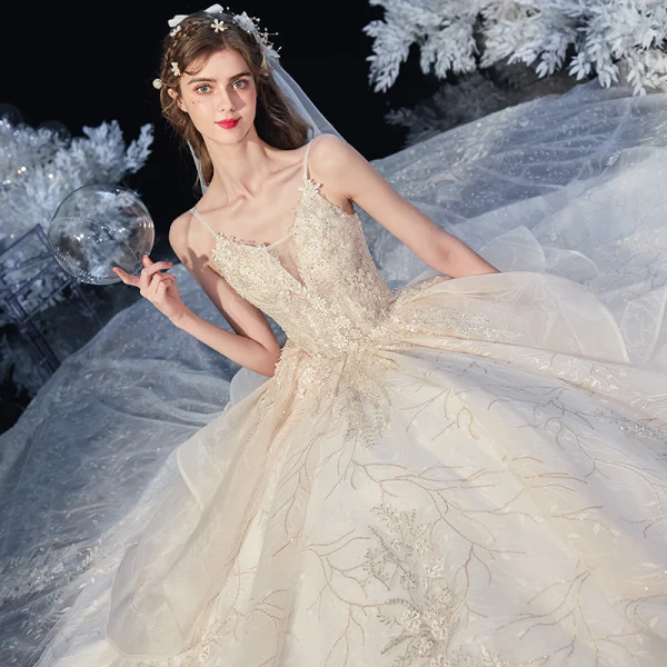 Romantic Champagne Bridal Wedding Dresses 2020 Ball Gown Spaghetti Straps Sleeveless Backless Leaf Appliques Lace Sequins Beading Cathedral Train Ruffle