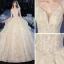 Romantic Champagne Bridal Wedding Dresses 2020 Ball Gown Spaghetti Straps Sleeveless Backless Leaf Appliques Lace Sequins Beading Cathedral Train Ruffle