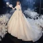 Chic / Belle Champagne La Mariée Robe De Mariée 2020 Robe Boule De l'épaule Manches Courtes Dos Nu Appliques En Dentelle Perlage Gland Cathedral Train Volants